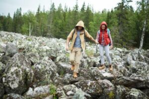 people walking on rocks in a bipolar disorder treatment program