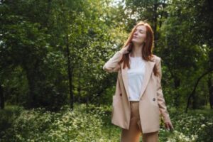 woman in the woods in an anxiety treatment program