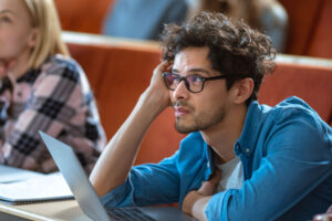 man in class wonders what untreated ADHD in adults looks like