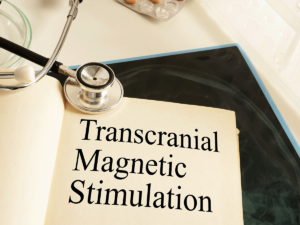 page in a book with "transcranial magnetic stimulation" on it answering the question of what does tms therapy do