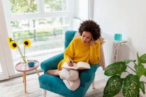 Person journaling for mental health