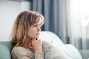 woman thinks about trauma counseling in towson