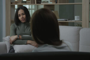 woman talks with therapist about whether her depression might be difficult to treat
