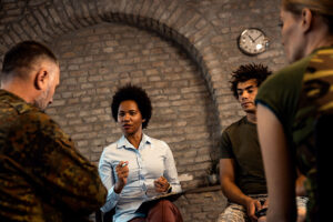 people talk in a group setting about mental health treatment in silver spring, md